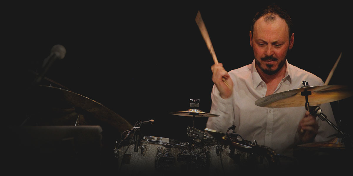 Guido May on the drumset during a live performance